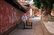 China: Buddhist monks with firewood, Kaiyuan Temple, Quanzhou, Fujian Province